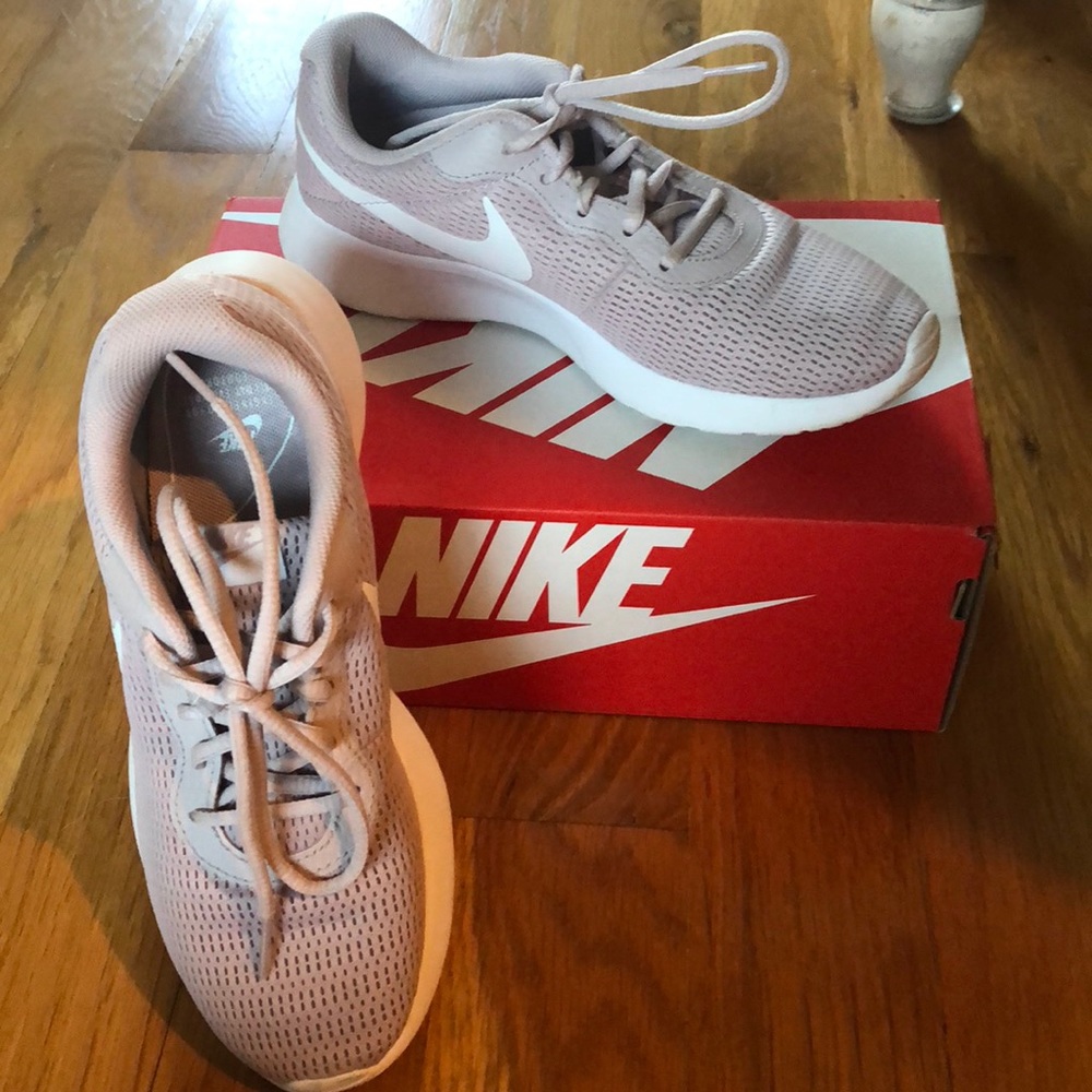 Nike Tanjun athletic shoes